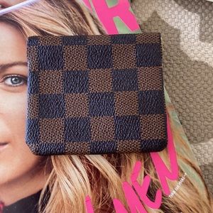 Brown checkered coin pouch;NWOT; approximately 3.5 inches wide/3 inches long